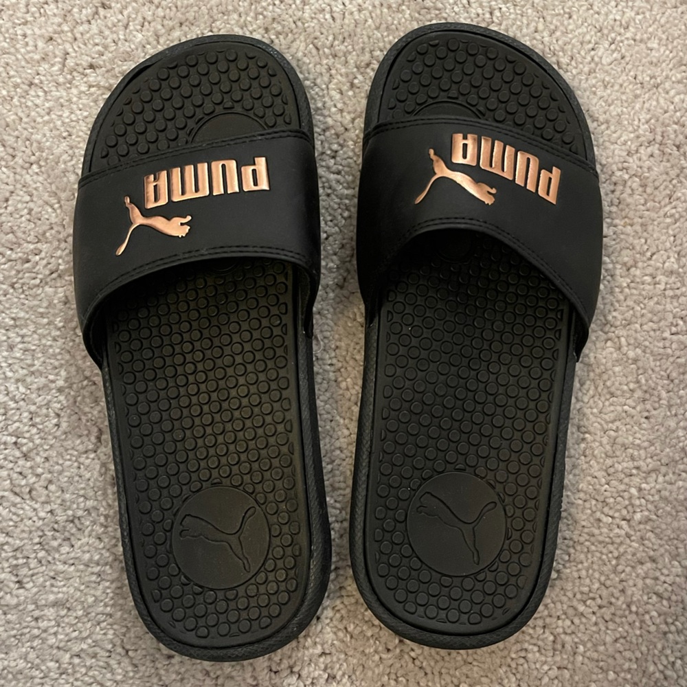Puma slides. Size 7. Never worn.